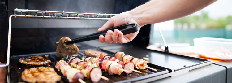 Happy union members grilling