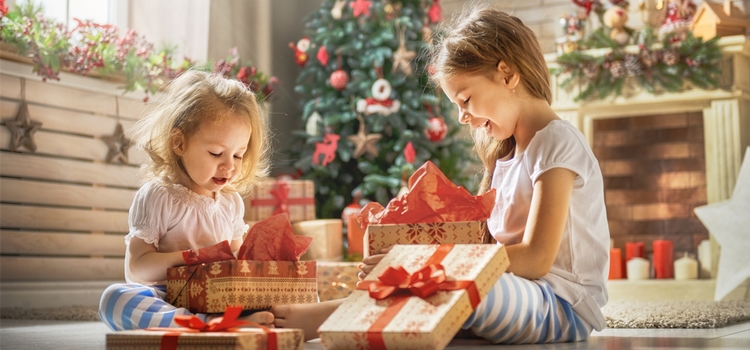 sisters opening gifts union-made holiday